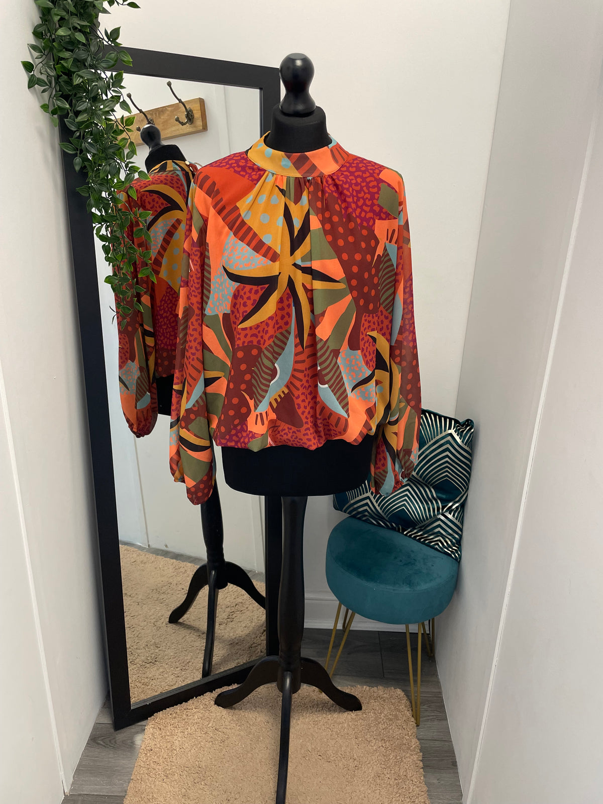 Printed High Neck Bubble Hem Blouses