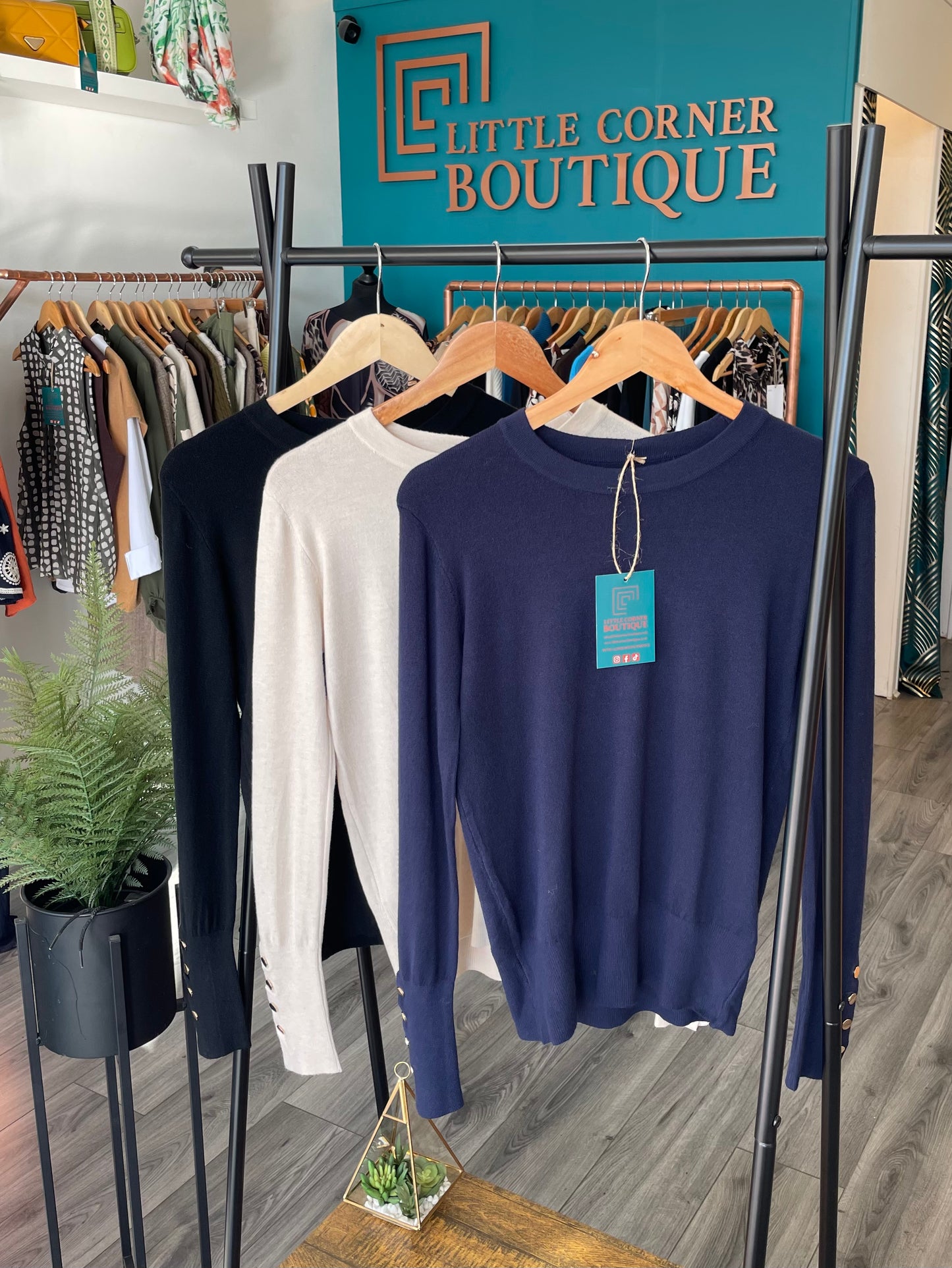 Button Sleeve Knit Tops
